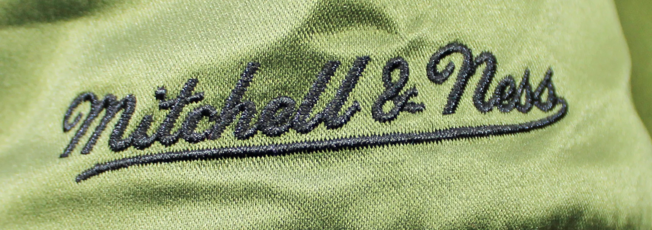 Rockets Hakeem Olajuwon & Clyde Drexler Signed Green M&N Bomber Jacket BAS Wit - Image 7